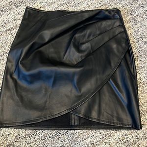 Size S mini Leather skirt with fun detailing.